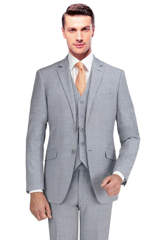 Man wearing a gray checkered suit with a white shirt and orange tie on a white background